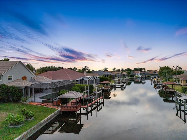 5510 E Longboat Blvd, Tampa, FL 33615 - exterior space featuring a yard, a water view, a residential view, and glass enclosure