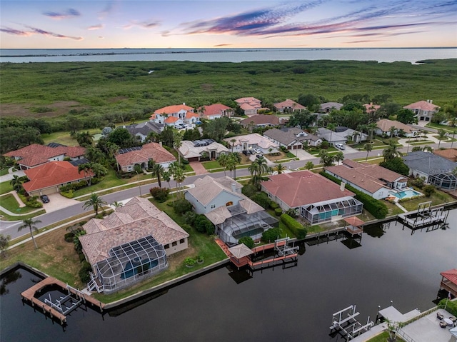 5510 E Longboat Blvd, Tampa, FL 33615 - drone / aerial view featuring a water view and a residential view