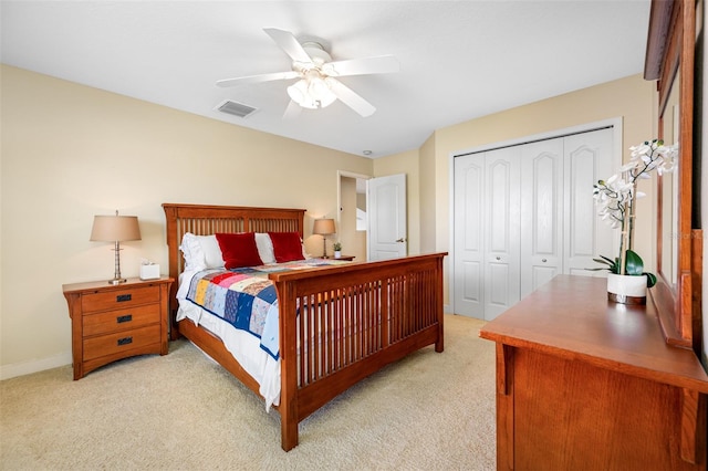 5510 E Longboat Blvd, Tampa, FL 33615 - bedroom featuring light colored carpet, a closet, a ceiling fan, and visible vents