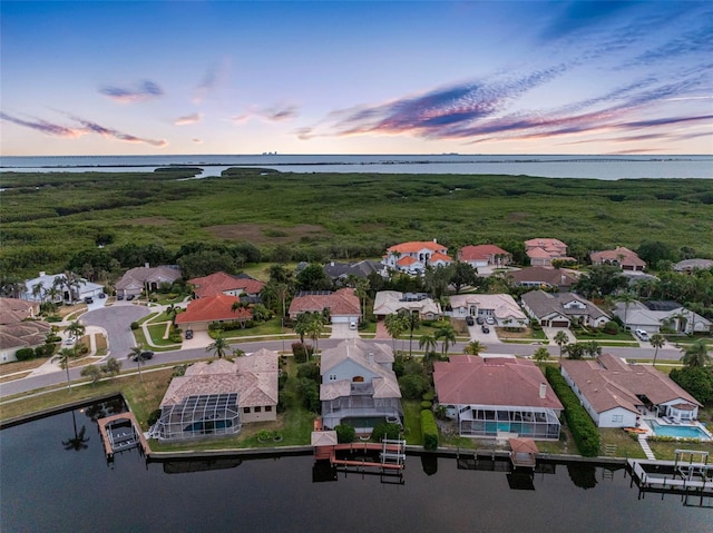 5510 E Longboat Blvd, Tampa, FL 33615 - birds eye view of property with a water view and a residential view