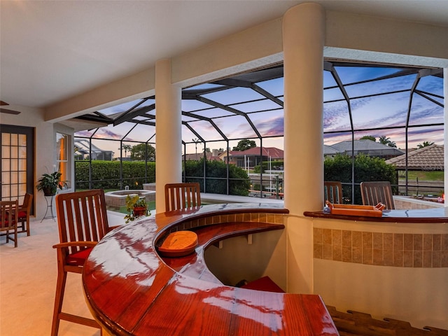 5510 E Longboat Blvd, Tampa, FL 33615 - view of patio / terrace featuring a ceiling fan, an in ground hot tub, and a lanai