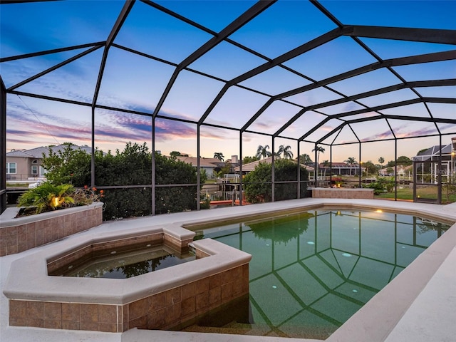 5510 E Longboat Blvd, Tampa, FL 33615 - view of pool with glass enclosure and a pool with connected hot tub