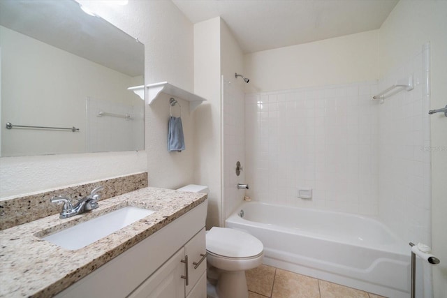 full bathroom featuring tile floors, tiled shower / bath combo, oversized vanity, and toilet