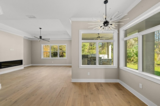 unfurnished sunroom with an inviting chandelier