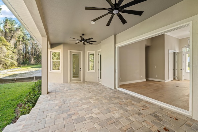 view of patio / terrace featuring ceiling fan