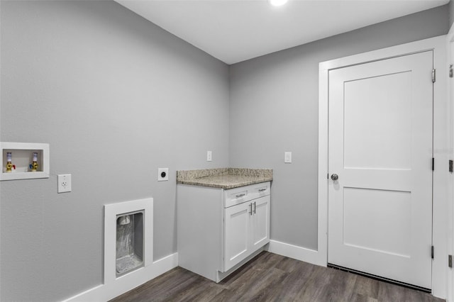 clothes washing area featuring cabinets, hookup for an electric dryer, dark wood-type flooring, and washer hookup