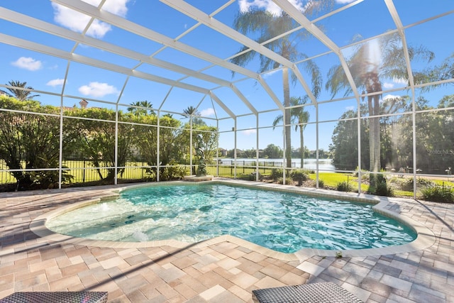 view of pool with a lanai and a patio