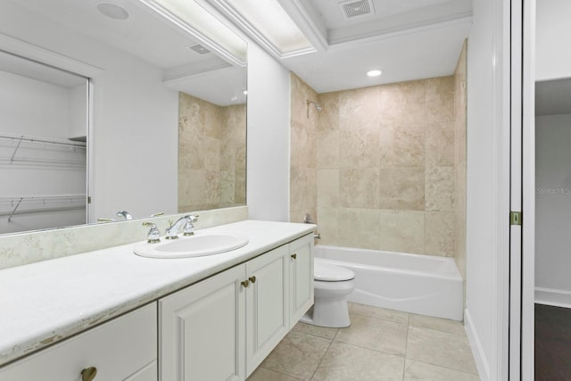 full bathroom featuring tiled shower / bath, vanity, tile patterned flooring, and toilet