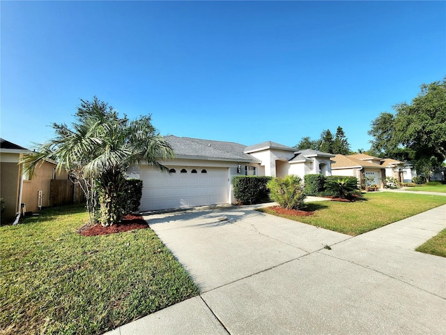 ranch-style home with a garage and a front lawn