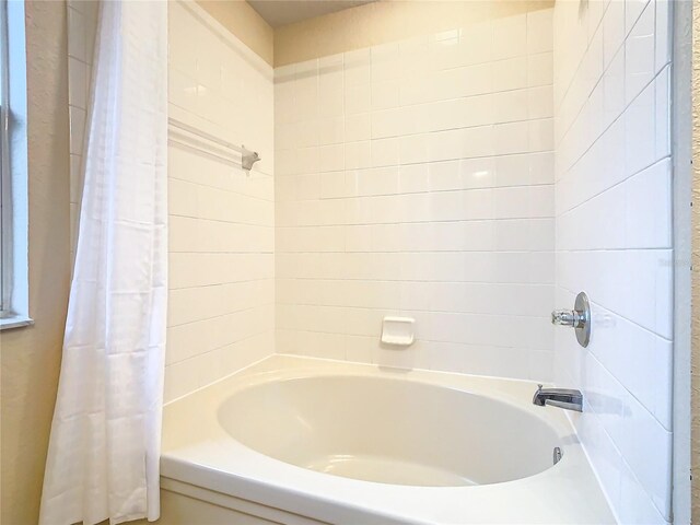 2705 Bushman Dr, Kissimmee, FL 34746 - full bathroom with shower / tub combo
