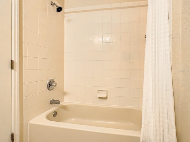 2705 Bushman Dr, Kissimmee, FL 34746 - full bathroom featuring shower / bathtub combination with curtain