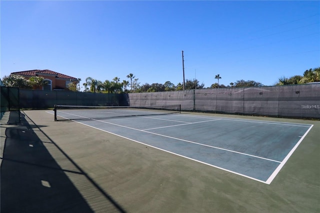 2705 Bushman Dr, Kissimmee, FL 34746 - view of tennis court featuring community basketball court