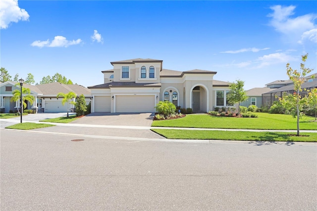 mediterranean / spanish-style house featuring a front lawn