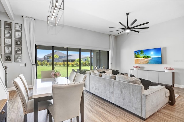 dining room featuring light wood-type flooring and ceiling fan