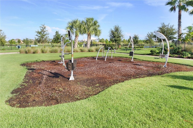 view of playground with a yard