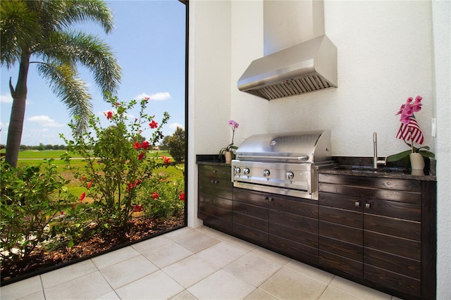 view of patio / terrace with sink, grilling area, and exterior kitchen