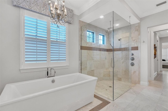 bathroom featuring separate shower and tub, ornamental molding, and an inviting chandelier