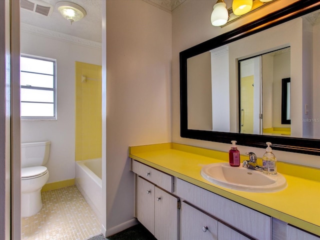 full bathroom featuring oversized vanity, toilet, tile floors, crown molding, and tub / shower combination