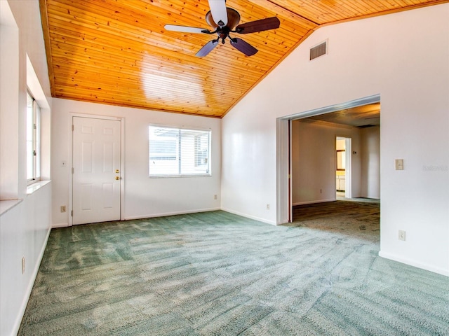 empty room with wooden ceiling, carpet flooring, plenty of natural light, and ceiling fan