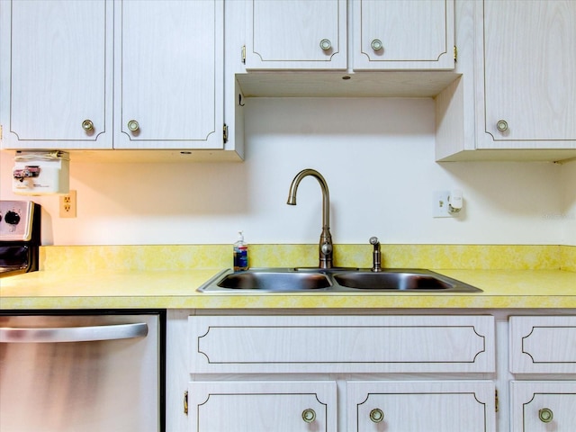 kitchen with dishwasher and sink