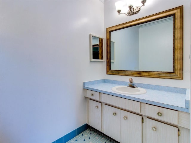 bathroom featuring oversized vanity and tile floors