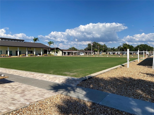 surrounding community featuring a lawn