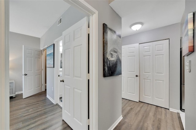 hall featuring hardwood / wood-style floors