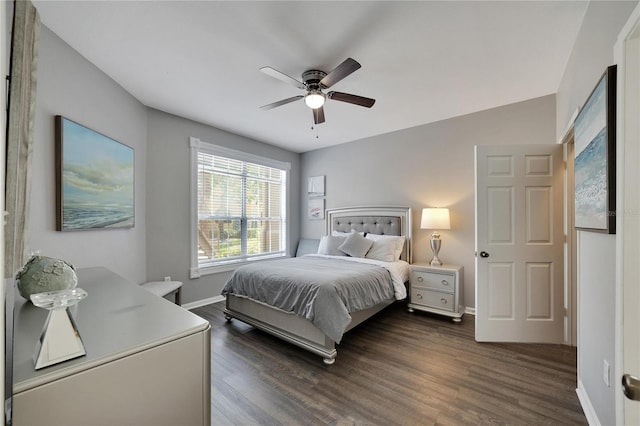 bedroom featuring ceiling fan and dark hardwood / wood-style floors