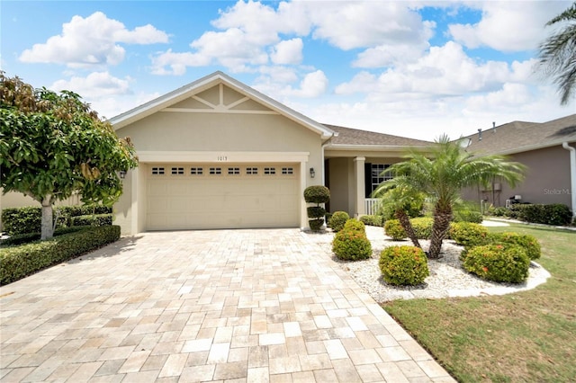 ranch-style house featuring a garage