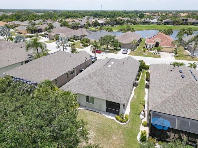 drone / aerial view with a water view