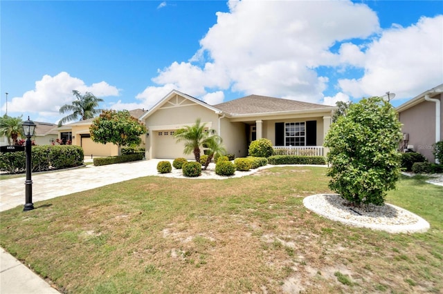 view of front of home featuring a garage and a front lawn