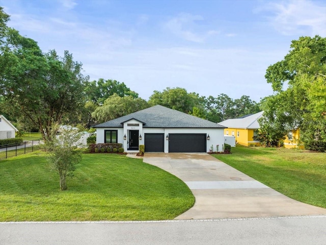 ranch-style house with a garage and a front yard