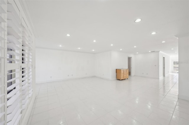 interior space featuring baseboards and recessed lighting