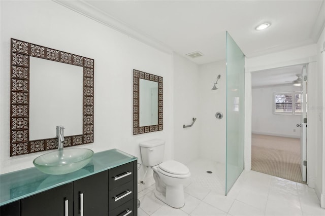 bathroom with ceiling fan, tile patterned flooring, toilet, visible vents, and vanity