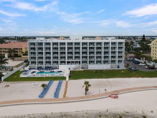 view of building exterior with a swimming pool