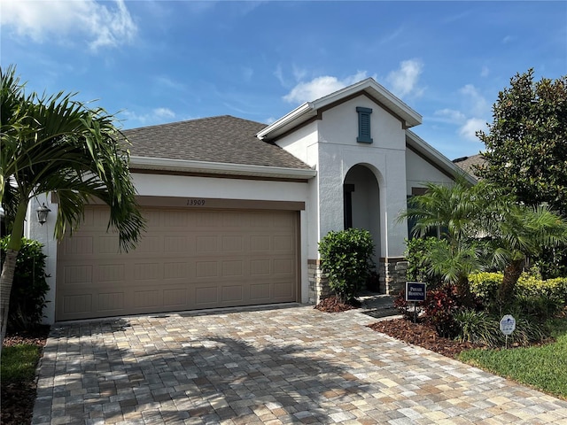 view of front of property with a garage