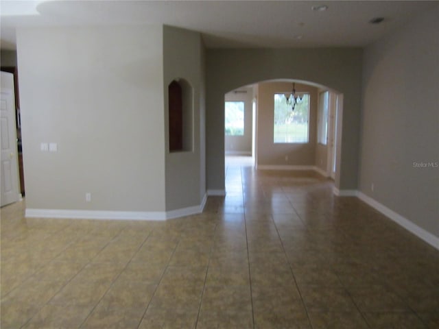 view of tiled spare room