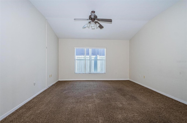 spare room with ceiling fan and carpet flooring