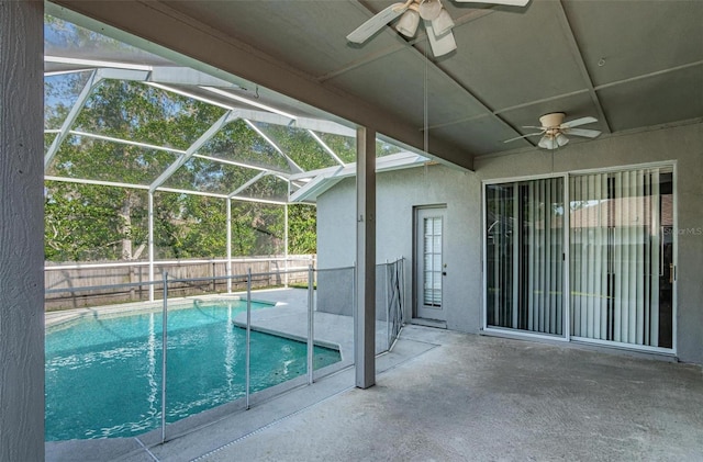 view of pool featuring a patio, a lanai, and ceiling fan