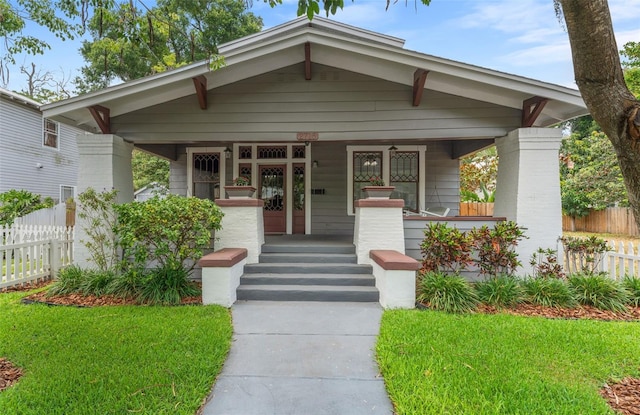 view of front of property featuring covered porch