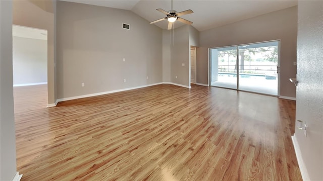 unfurnished room featuring high vaulted ceiling, ceiling fan, and light wood-type flooring