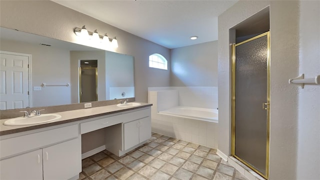 bathroom with dual bowl vanity, independent shower and bath, and tile flooring