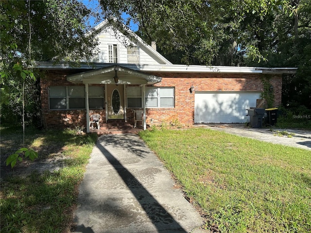 view of front facade featuring a garage and a front lawn