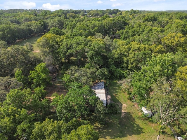 bird's eye view featuring a forest view