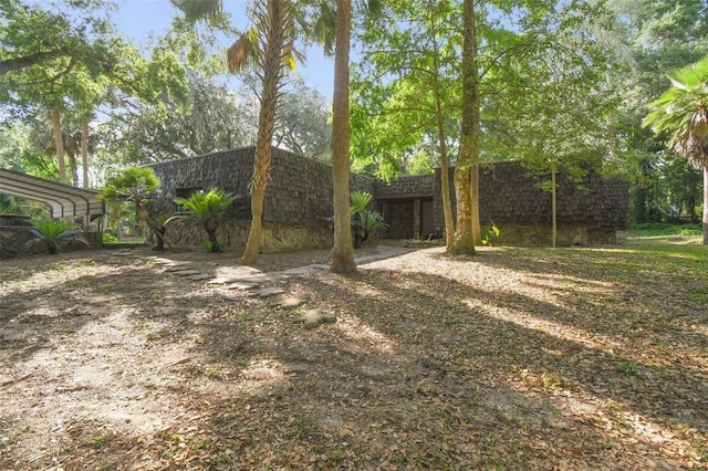 view of yard featuring a detached carport