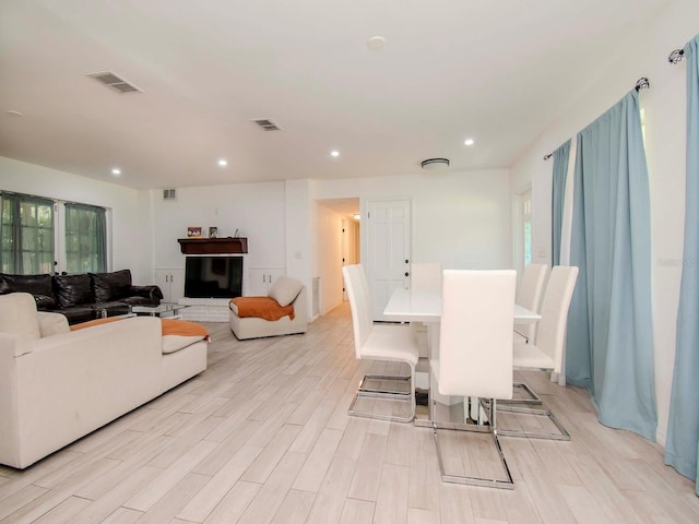 dining room featuring light hardwood / wood-style flooring