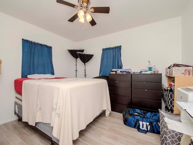 bedroom featuring ceiling fan and light wood-type flooring