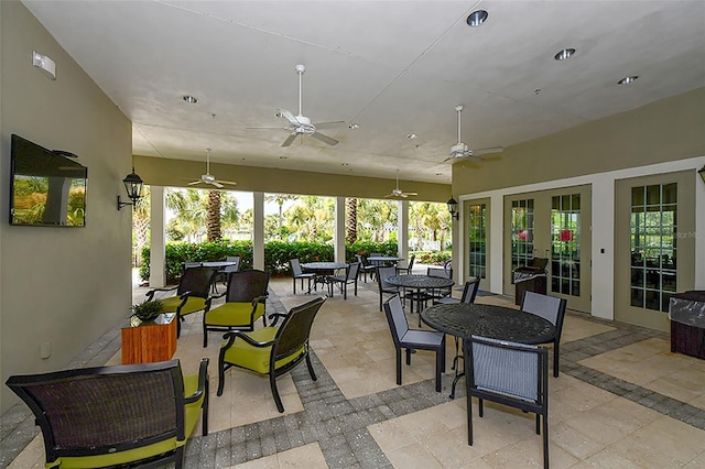 view of patio featuring ceiling fan