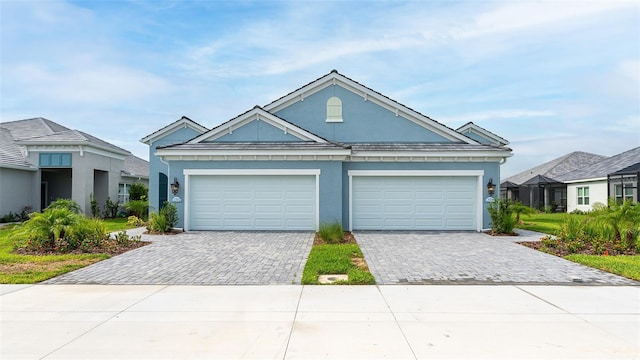 view of front of property with a garage