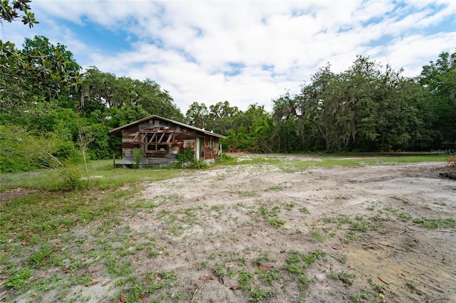 7813 Valrie Ln, Riverview, FL 33569 - view of yard with an outdoor structure